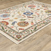 10' X 13' Ivory Green Blues Pink Yellow Rust Brown Tan And Grey Oriental Power Loom Stain Resistant Area Rug With Fringe