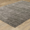 6' X 9' Charcoal Grey Grey Ivory Tan And Brown Abstract Power Loom Stain Resistant Area Rug