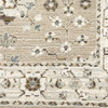 5' X 7' Beige Ivory Blue Green And Purple Oriental Power Loom Stain Resistant Area Rug