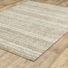 10' X 13' Ivory Grey Tan And Brown Abstract Power Loom Stain Resistant Area Rug