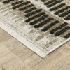 5' X 8' Beige Ivory Charcoal Brown Tan And Grey Abstract Power Loom Stain Resistant Area Rug With Fringe