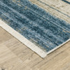 8' X 11' Blue Dark Blue Teal Grey Ivory Beige And Tan Geometric Power Loom Stain Resistant Area Rug With Fringe
