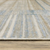 8' X 11' Blue Dark Blue Teal Grey Ivory Beige And Tan Geometric Power Loom Stain Resistant Area Rug With Fringe