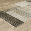 8' X 11' Beige Charcoal Brown Grey Tan Gold And Blue Geometric Power Loom Stain Resistant Area Rug With Fringe