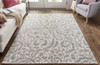 10' X 14' Blue Ivory And Tan Floral Distressed Stain Resistant Area Rug