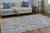 5' X 8' Gray Ivory And Tan Geometric Hand Woven Stain Resistant Area Rug With Fringe