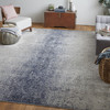 9' X 12' Ivory And Blue Abstract Power Loom Area Rug