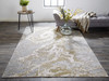 10' X 13' Ivory Silver And Gold Abstract Stain Resistant Area Rug