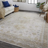 5' X 8' Gold And Ivory Floral Stain Resistant Area Rug