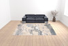 10' X 13' Ivory Gray And Blue Abstract Stain Resistant Area Rug