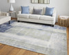 8' X 10' Blue Green And Ivory Abstract Power Loom Distressed Area Rug