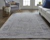 12' X 15' Gray And Ivory Floral Power Loom Distressed Stain Resistant Area Rug