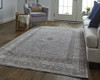 7' X 9' Gray Orange And Ivory Floral Power Loom Stain Resistant Area Rug