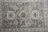 8' Gray Brown And Blue Round Floral Stain Resistant Area Rug