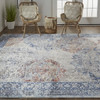 7' X 10' Blue Ivory And Red Floral Power Loom Distressed Stain Resistant Area Rug