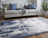 8' X 10' Tan Blue And Ivory Abstract Power Loom Distressed Area Rug