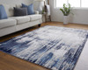 12' X 15' Tan Blue And Ivory Abstract Power Loom Distressed Area Rug