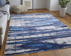 10' X 13' Ivory Blue And Gray Abstract Power Loom Distressed Area Rug