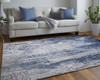 9' X 12' Ivory Blue And Black Abstract Power Loom Distressed Area Rug
