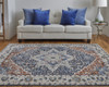 10' X 13' Ivory Blue And Red Floral Power Loom Area Rug With Fringe