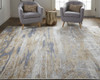 4' X 6' Tan Orange And Ivory Abstract Power Loom Distressed Area Rug