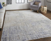 5' X 8' Tan Ivory And Gray Abstract Power Loom Distressed Area Rug