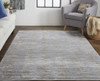 5' X 8' Taupe Silver And Tan Abstract Power Loom Area Rug