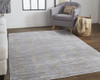 5' X 8' Taupe Silver And Tan Abstract Power Loom Area Rug