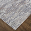 7' X 9' Taupe Tan And Orange Abstract Power Loom Distressed Stain Resistant Area Rug