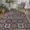 10' X 13' Blue Red And Tan Abstract Power Loom Distressed Stain Resistant Area Rug