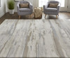 4' X 6' Ivory Tan And Brown Abstract Power Loom Distressed Stain Resistant Area Rug