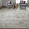 5' X 8' Ivory And Tan Floral Hand Knotted Stain Resistant Area Rug