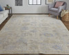 5' X 8' Tan Orange And Blue Floral Hand Knotted Stain Resistant Area Rug