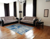 5' X 8' Blue And Ivory Stain Resistant Area Rug