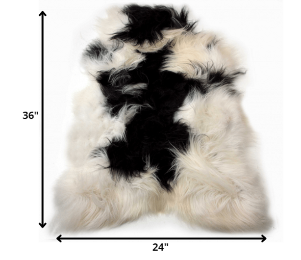 24" x 36" x 1.5" x 2" Spotted Sheepskin Single Long-Haired - Area Rug