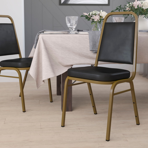 HERCULES Series Trapezoidal Back Stacking Banquet Chair in Black Vinyl - Gold Frame