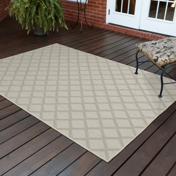 5' X 7' Ivory Geometric Stain Resistant Indoor Outdoor Area Rug