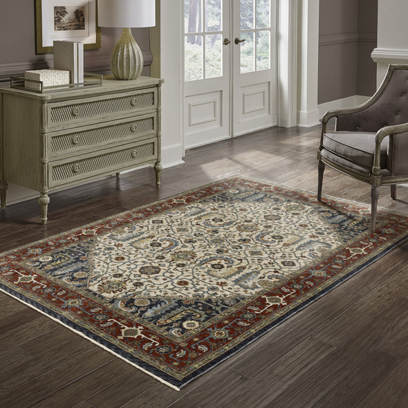 2' X 3' Ivory Beige Red Blue Gold Green And Navy Oriental Power Loom Stain Resistant Area Rug With Fringe