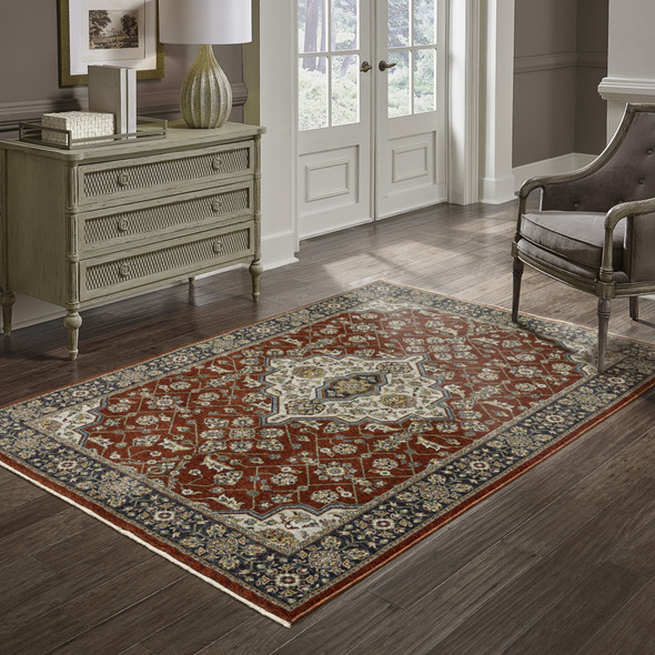 6' X 9' Red Ivory Blue Navy Gold And Grey Oriental Power Loom Stain Resistant Area Rug With Fringe