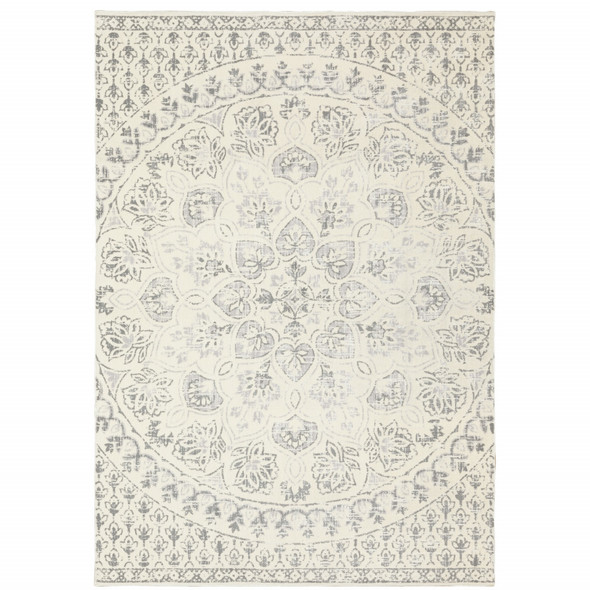 6' X 9' Ivory And Grey Floral Power Loom Stain Resistant Area Rug