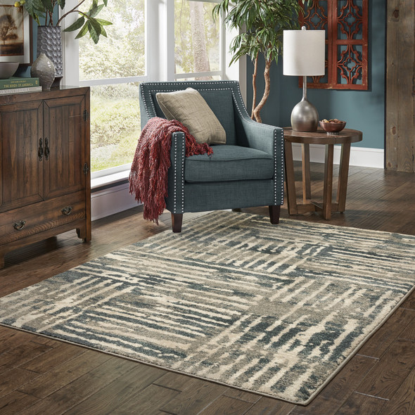 6' X 9' Blue And Beige Abstract Power Loom Stain Resistant Area Rug