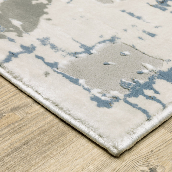 3' X 5' Grey Blue Brown Ivory And Deep Blue Abstract Power Loom Stain Resistant Area Rug
