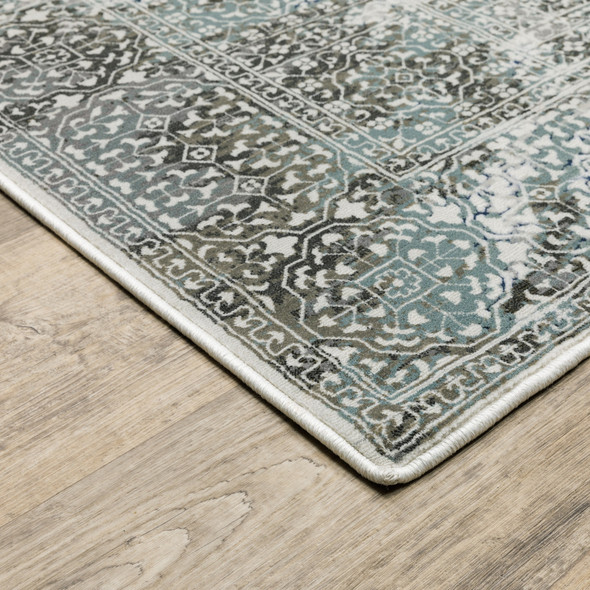 8' X 11' Ivory Grey Charcoal Blue And Rust Oriental Power Loom Stain Resistant Area Rug