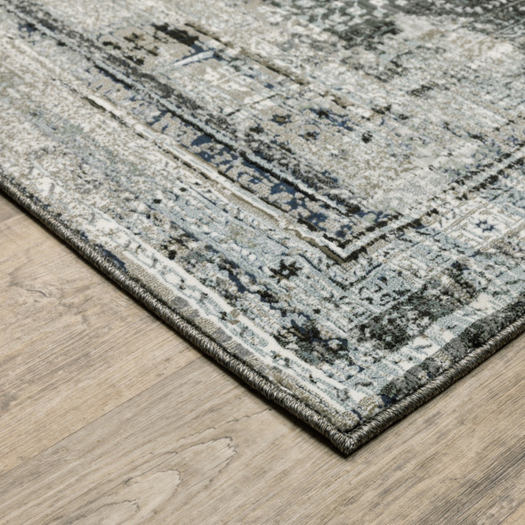 4' X 6' Charcoal Grey Blue Ivory And Taupe Oriental Power Loom Stain Resistant Area Rug