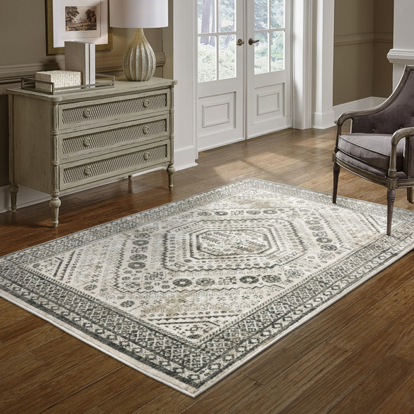 10' X 13' Ivory Grey Black And Ivory Oriental Power Loom Stain Resistant Area Rug