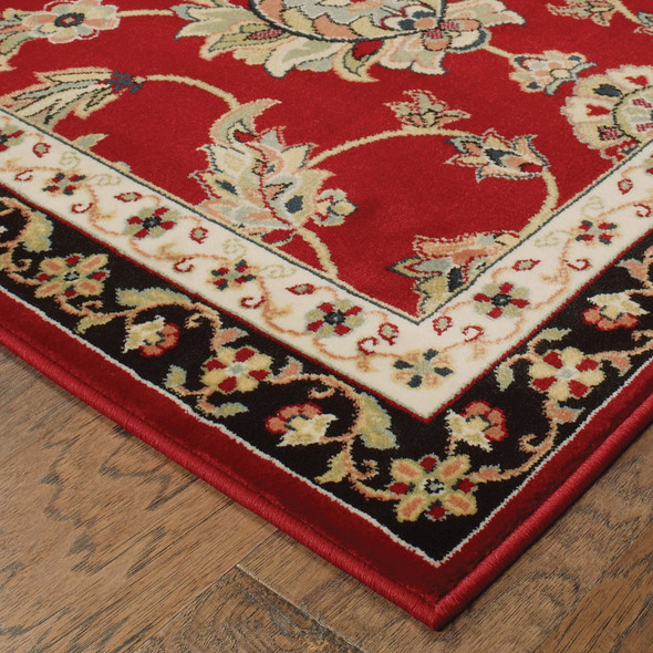 5' X 8' Red Black Blue Ivory Green And Salmon Oriental Power Loom Stain Resistant Area Rug