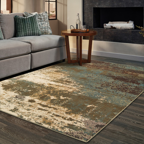 5' X 7' Teal Blue Brown Green And Beige Abstract Power Loom Stain Resistant Area Rug