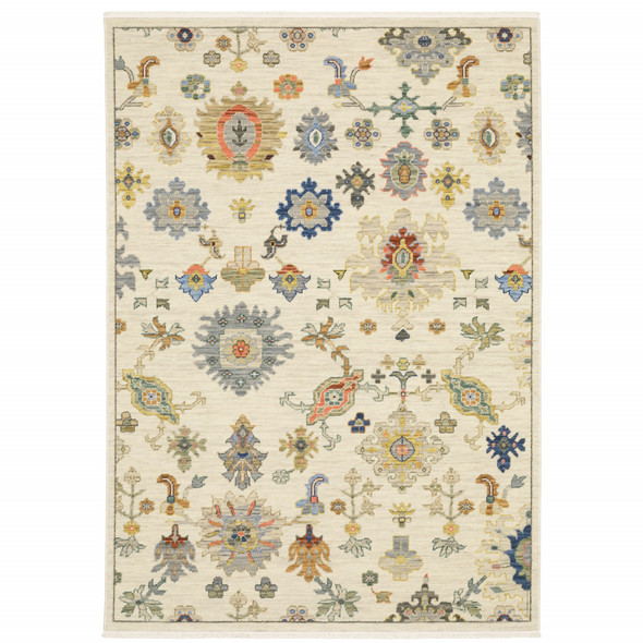 6' X 9' Ivory Beige Gold Grey Blue Pink Red Rust And Green Oriental Power Loom Stain Resistant Area Rug With Fringe