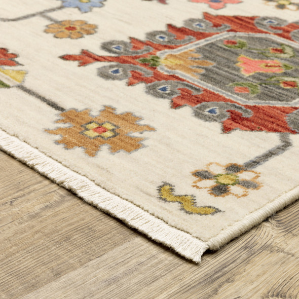 2' X 3' Ivory Yellow Rust Green Grey Pink Orange Blue And Grey Oriental Power Loom Stain Resistant Area Rug With Fringe