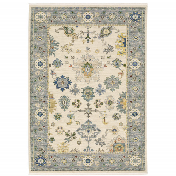 2' X 3' Ivory Blue Grey Teal Gold Green And Rust Oriental Power Loom Stain Resistant Area Rug With Fringe